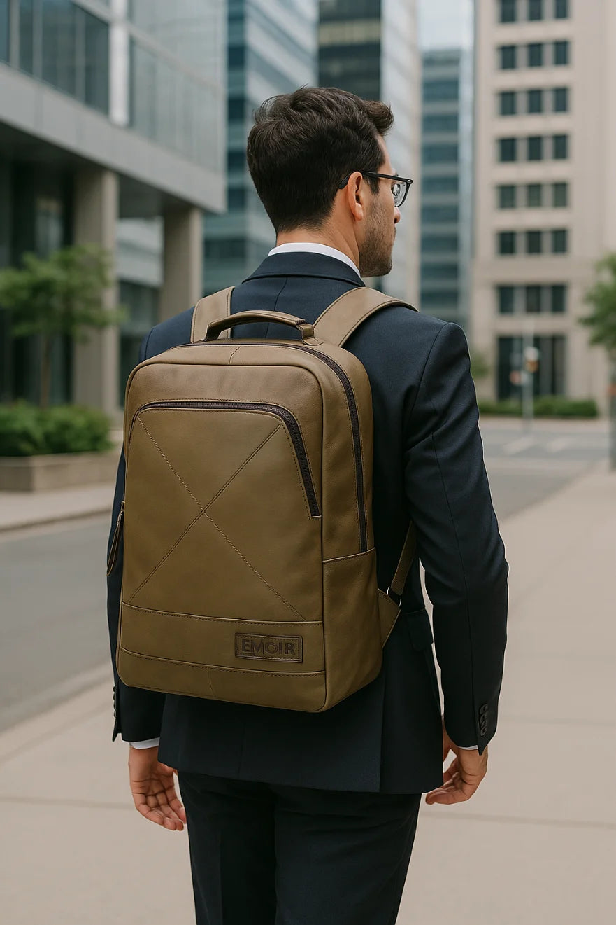 beige leather backpack carried by a corporate professional